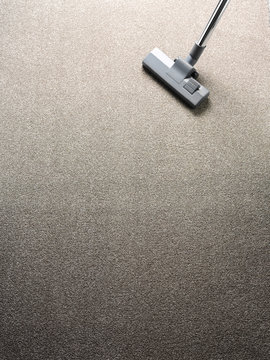 Vacuum cleaner on a carpet