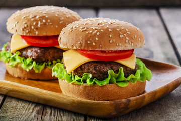 mini hamburger with cheese and tomato