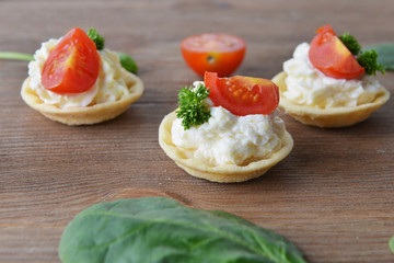 tartlet with cream, tomato and dill