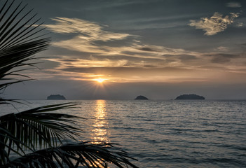 Fototapeta na wymiar Sunset on the beach of Siam Bay, Thailand