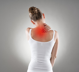 Neck cramp. Young woman having back illness. - 73724139
