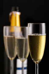 Champagne flutes and bottle