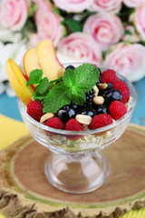 Healthy breakfast - yogurt with  fresh fruit, berries and