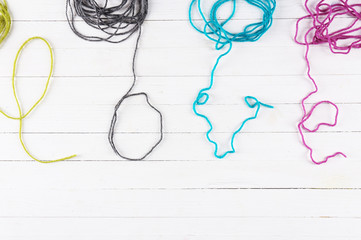 Love word formed with colorful knitting yarn