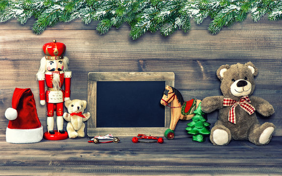 christmas decoration with antique toys and blackboard