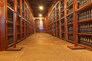 The shelves are made with wine bottles