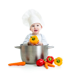 cook baby inside big pan with healthy food