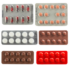 collection of pills in transparent blister packs