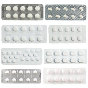collection of pills in transparent blister packs