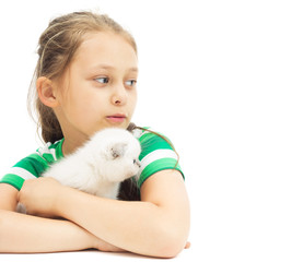 Fototapeta na wymiar little girl and kitten on a white background isolated