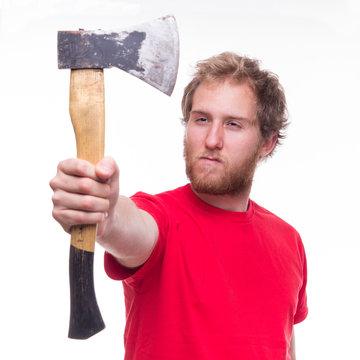 Portrait of bearded lumberjack with an axe