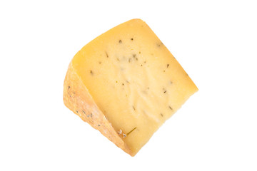 triangular piece of cheese with herbs isolated on a white backgr