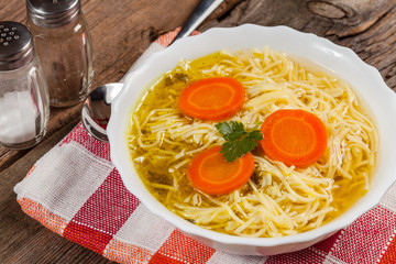 Broth - chicken soup with noodles.