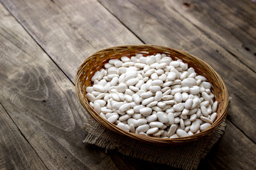 wicker basket full of beans, food closeup