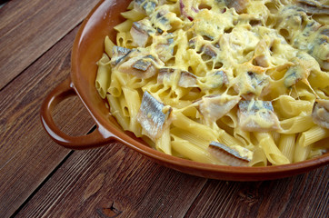 Baked pasta penne with mackerel