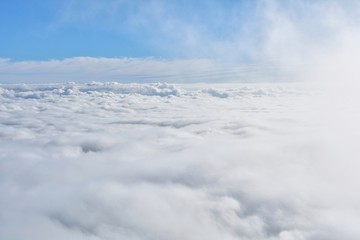 Fototapeta premium Blue sky with clouds and fog