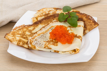 Pancakes with red caviar