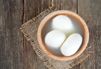 mozzarella cheese on wooden table