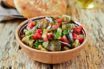 Baked vegetable salad with eggplant, paprika and tomato