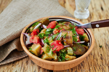 Baked vegetable salad with eggplant, paprika and tomato