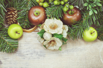 Christmas decoration. Green decoration with fruits