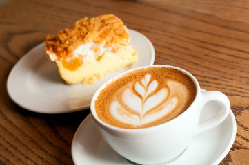 cappuccino cup with cake
