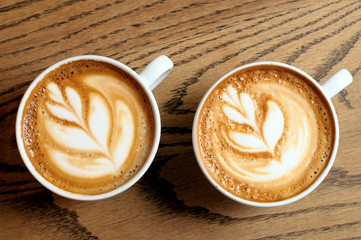 two cappuccino cups