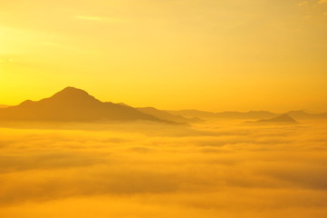 Mountain Landscape in the Mist at Sunrise