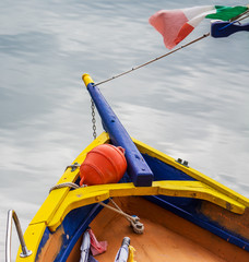 colorful boat by the shore in Temo river