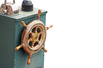 vintage boat wheel on white
