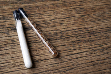 White and brown sugar in tube