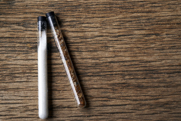 White and brown sugar in tube