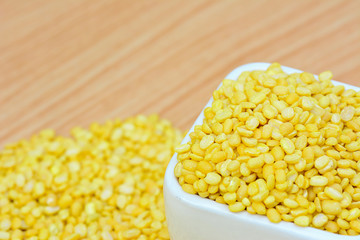 spilt  yellow mung bean  wood table for foodconcept