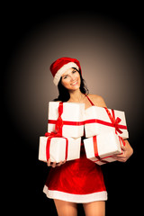Santa hat Christmas woman holding christmas gifts