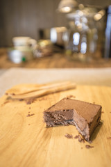 Homemade chocolate tart on a wooden board
