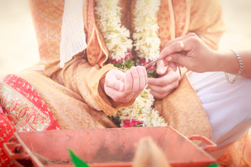 newlywed hands with mehendi