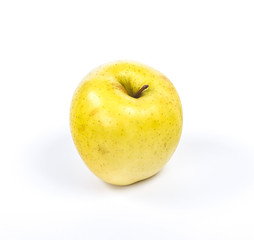 whole yellow apple, isolated on a white background