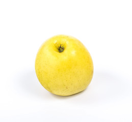 whole yellow apple, isolated on a white background