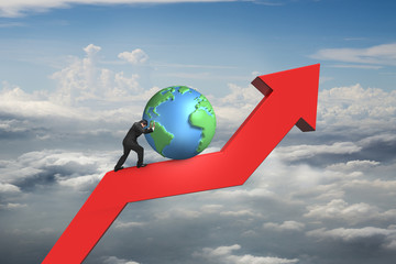 businessman push globe upward on red trend line