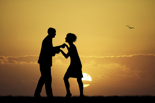 couple dancing at sunset