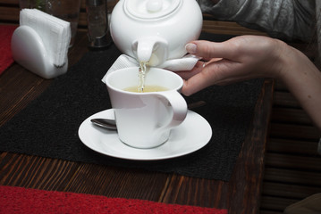 Tea poured from a teapot