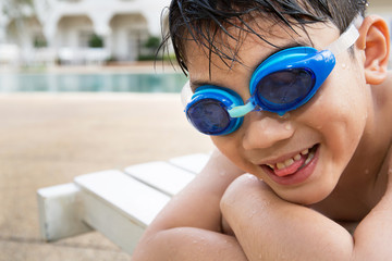 Portrait of happy little boy ready to swimming