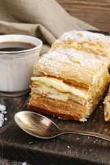 Cream pie made of two layers of puff pastry, filled with whipped