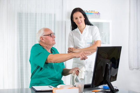 Old doctor and a nurse are consulted