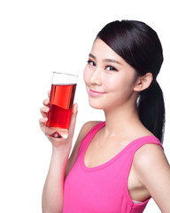 Young happy woman drink juice