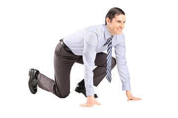 Happy businessman ready to run