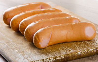 Sausages  on  wooden board