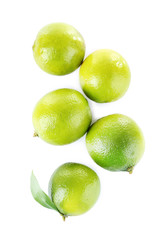 Fresh juicy limes isolated on white