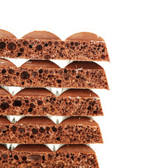 Tasty porous chocolate, isolated on white