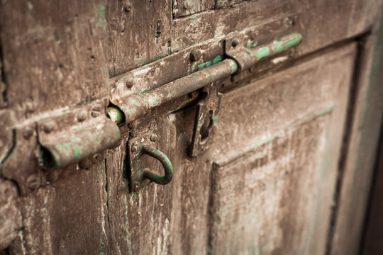 iron lock old wooden door